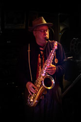 Dr. Jazz playing saxophone