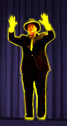 Dr. Jazz, hands raised over his head as if to summon a being from another dimension