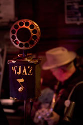 Dr. Jazz$rsquo; microphone, and old-time basket-type with the letters WJAZ displayed prominently